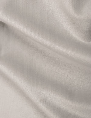 Close-up of the mineral velvet fabric on the Clementine platform bed