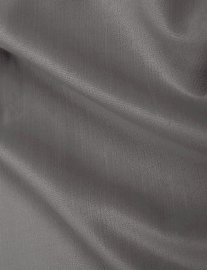 Close-up of the steel velvet fabric on the Clementine platform bed