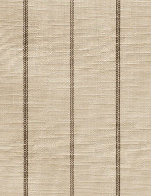 Detailed shot of the linen and stripe pattern on the Adara natural stripe linen upholstered bed.