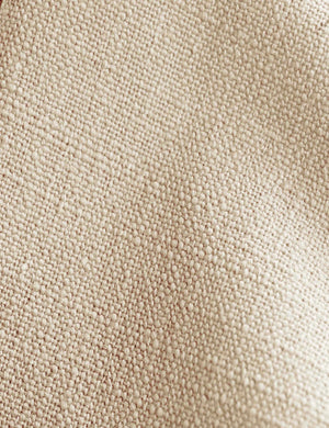 Detailed shot of the natural linen on the Adara natural linen upholstered bed.