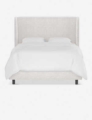 Adara white boucle upholstered bed.