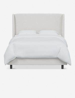 Adara white velvet upholstered bed.