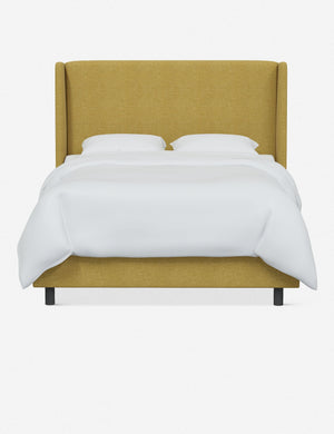 Adara yellow linen upholstered bed.