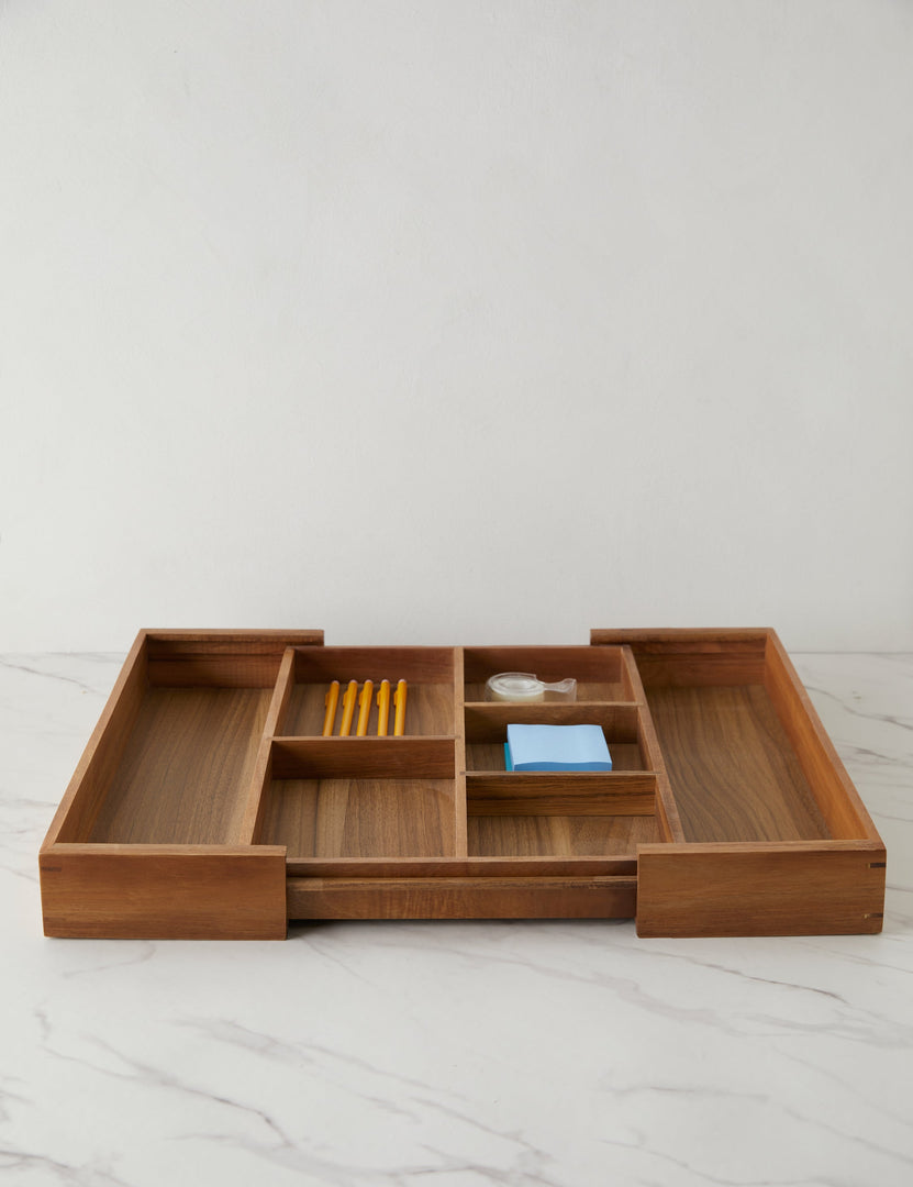 The Acacia Expandable Drawer Insert by NEAT Method from Lulu and Georgia Stage displays yellow pencils, a small tape roll, and blue sticky notes on a white marble surface against a light backdrop.