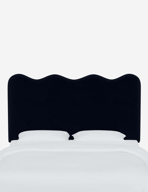 Clementine Navy Velvet Headboard with a scalloped shape at the top