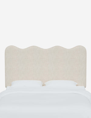 Clementine Talc Linen Headboard with a scalloped shape at the top