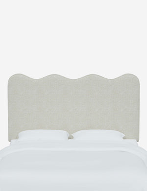 Clementine White Boucle Headboard with a scalloped shape at the top