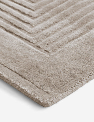 Close up of the corner of the Halden handwoven carved design rug.