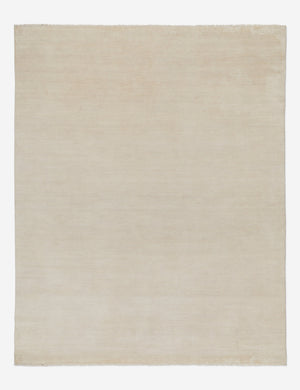 Heritage ivory 100% wool hand-knotted rug with fringe detailing