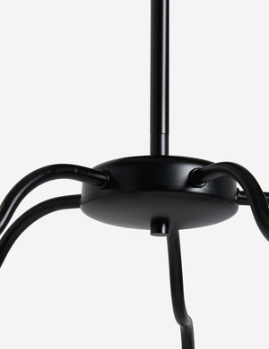 Close up view of the Kukka large modern wavy arm chandelier in bronze