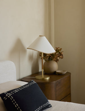 Arroyo Mixed-Material Table Lamp by Elan Byrd styled on a bedside table.