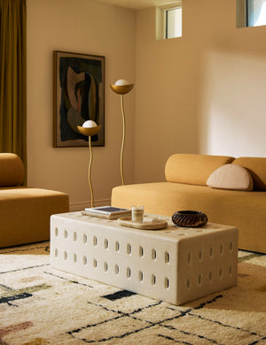 Kukka modern two light wavy base floor lamp in brass