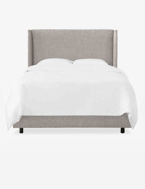 Adara light gray linen upholstered bed.