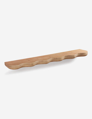 Cario sculptural wavy edge oak wall shelf.