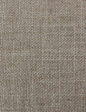 Detailed shot of the navy linen on the Adara light gray linen upholstered bed.