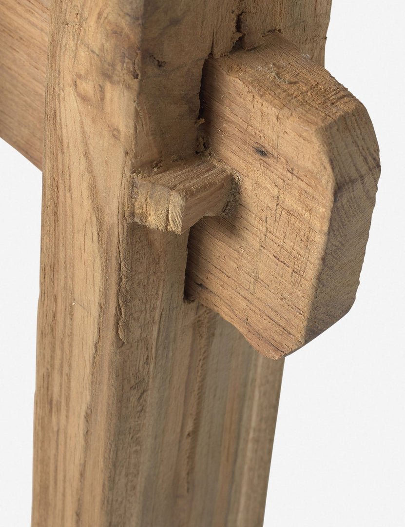 | Close-up of the leg detailing on the Arlene craftsman-style antiqued teak wood bench